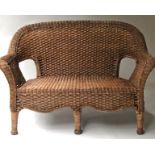 WICKER BENCH, French style, woven cane and rattan with pierced back and outswept arms, 127cm W.