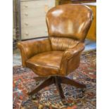 SWIVEL DESK CHAIR, brown leather on castors, 72cm W.