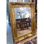 WALL MIRROR, Continental style gilt frame, 120cm x 89cm.