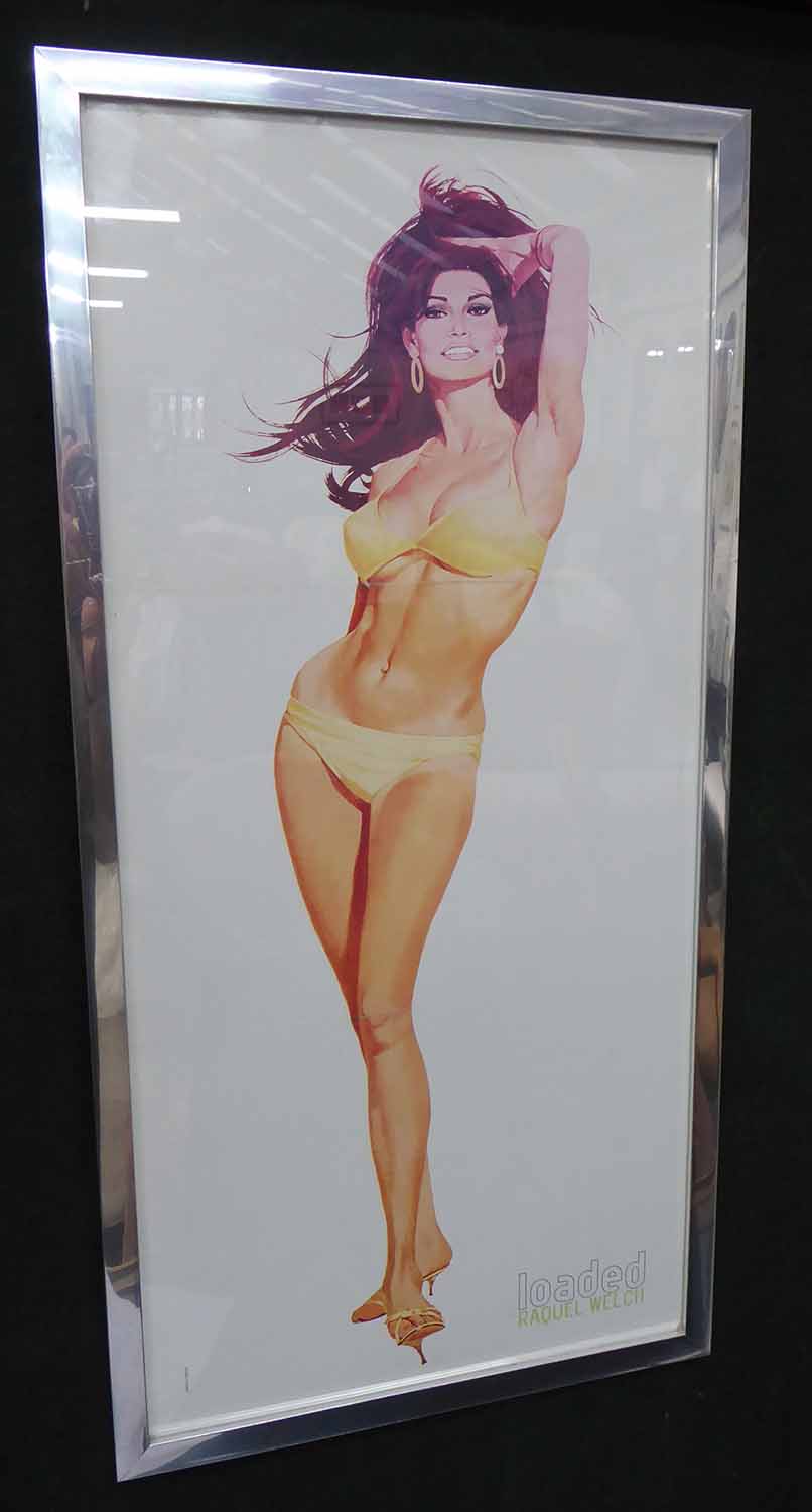 LOADED MAGAZINE RACQUEL WELCH POSTER, after Roland Corant, framed and glazed, 63.5cm x 31.5cm.