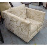 DESIGNERS GUILD UPHOLSTERED ARMCHAIR, with beige and gold foliate patterned upholstery,