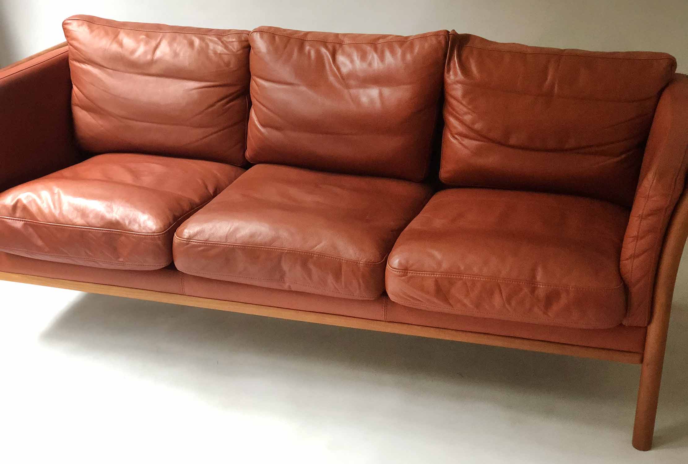 SOFA, mid 20th century Danish in hand finished grained mid brown leather with three seat cushions, - Image 3 of 4