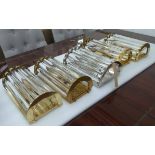 WALL LIGHTS, a set of five, vintage style, four in a glass tube design in a gilt finish,