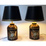 TEA CANNISTER LAMPS, a pair, vintage style in black with gilt royal coat of arms and matching shade.