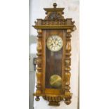 WALL CLOCK, circa 1900, Austrian walnut and beech with enamelled dial and gong striking movement,
