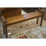 HALL BENCH, Victorian oak with a rectangular seat on bobbin turned supports,