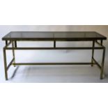 LOW TABLE, 1970's rectangular with glass inset top on stepped gilt metal support,