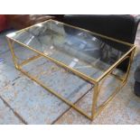 MAISON JANSEN STYLE COCKTAIL TABLE, gilt metal with glass top, 120cm x 65cm x 45cm.