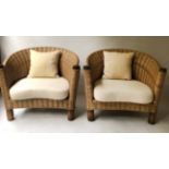 CONSERVATORY ARMCHAIRS, a pair, woven wicker with bar back and turned supports, 80cm H.