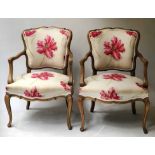 FAUTEUILS, a pair, French Louis XV style, lined back and floral cotton upholstery.