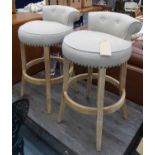 BAR STOOLS, a pair, in the contemporary country house style, buttoned back finish.
