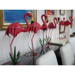 FLAMINGOS, a set of seven, 1950's American style, stylised finish, 76cm H.