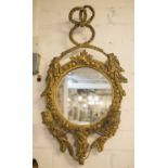 GIRANDOLE, 19th century giltwood and gesso with ribbon crest, circular plate and twin sconces,