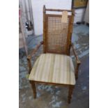 ARMCHAIR, caned back with faux bamboo frame, 55cm W x 103cm H.