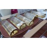WALL LIGHTS, a set of five, vintage style gilt and glass tube design, various sizes,