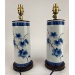 BRUSH POT TABLE LAMPS, a pair, Chinese blue and white ceramic with hardwood bases, 35cm H.