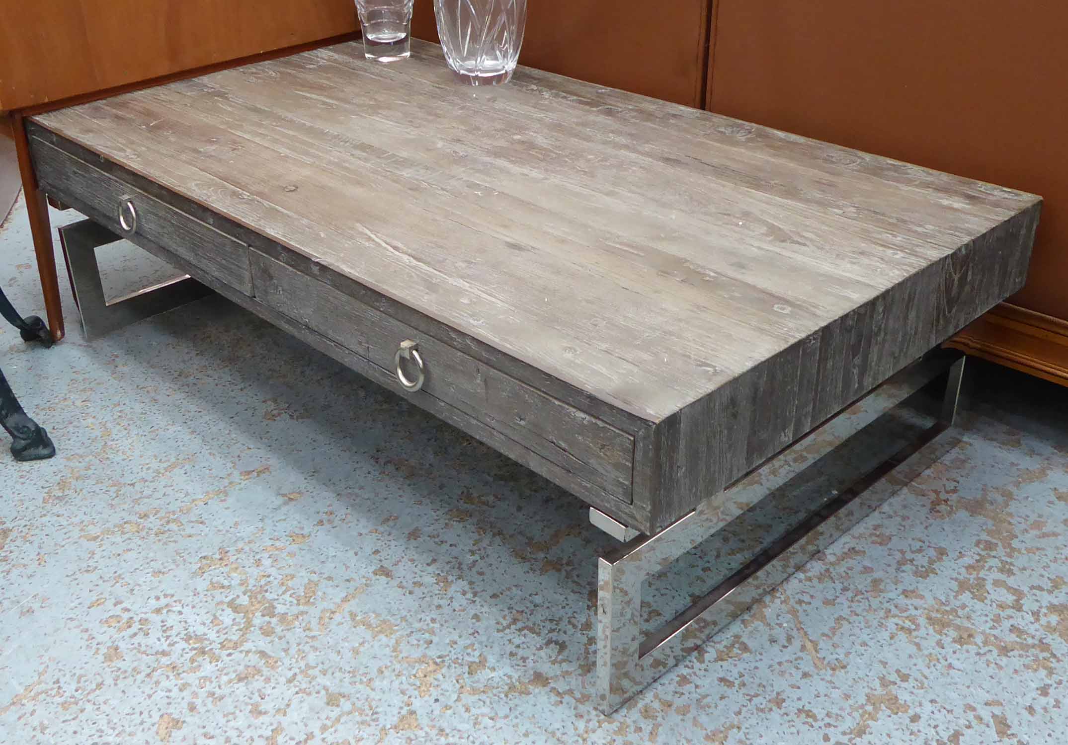 HAMPTONS STYLE LOW TABLE, contemporary grey wood with drawers on polished metal supports.