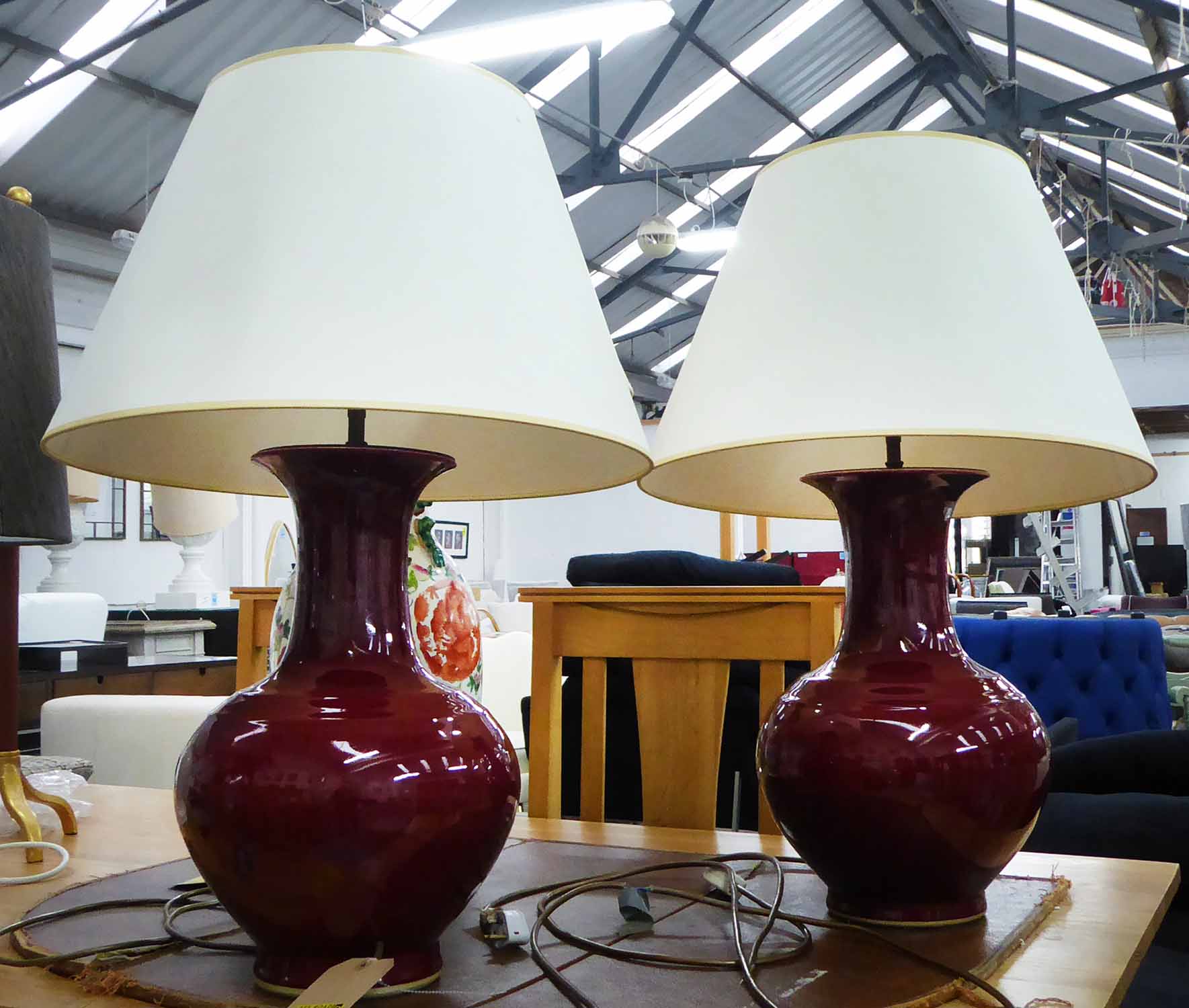 SANG DE BOEUF TABLE LAMPS, a pair with shades, 70cm H.