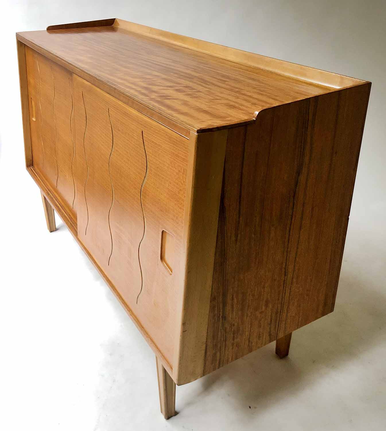 SIDEBOARD BY IAN AUDSLEY FOR G W EVANS, mid 20th century walnut and elm with sliding doors, - Image 6 of 6