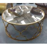 COCKTAIL TABLE, Hollywood Regency style, mirrored top, 91cm D x 40cm H.