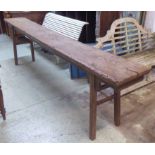 ALTAR TABLE, 19th century and later Chinese elm of very long proportions, 330cm L x 86cm H.