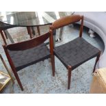 DINING CHAIRS, a set of four, mid 20th century Rosewood with black woven seats,