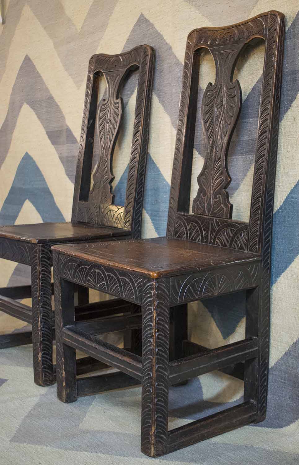 SIDE CHAIRS, a pair, early 18th century elm with all over carving. - Image 2 of 2