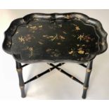 VICTORIAN TRAY, black papier maché scalloped gilt and painted with later gilt decorated stand,