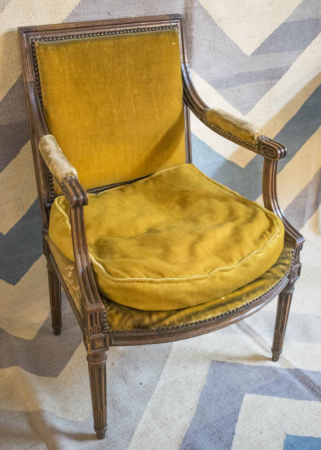 FAUTEUIL, 19th century French walnut with cushion seat in gold plush, 63cm W.