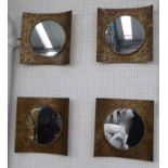 WALL MIRRORS, a set of four, contemporary design, bronzed frames, 40cm H.