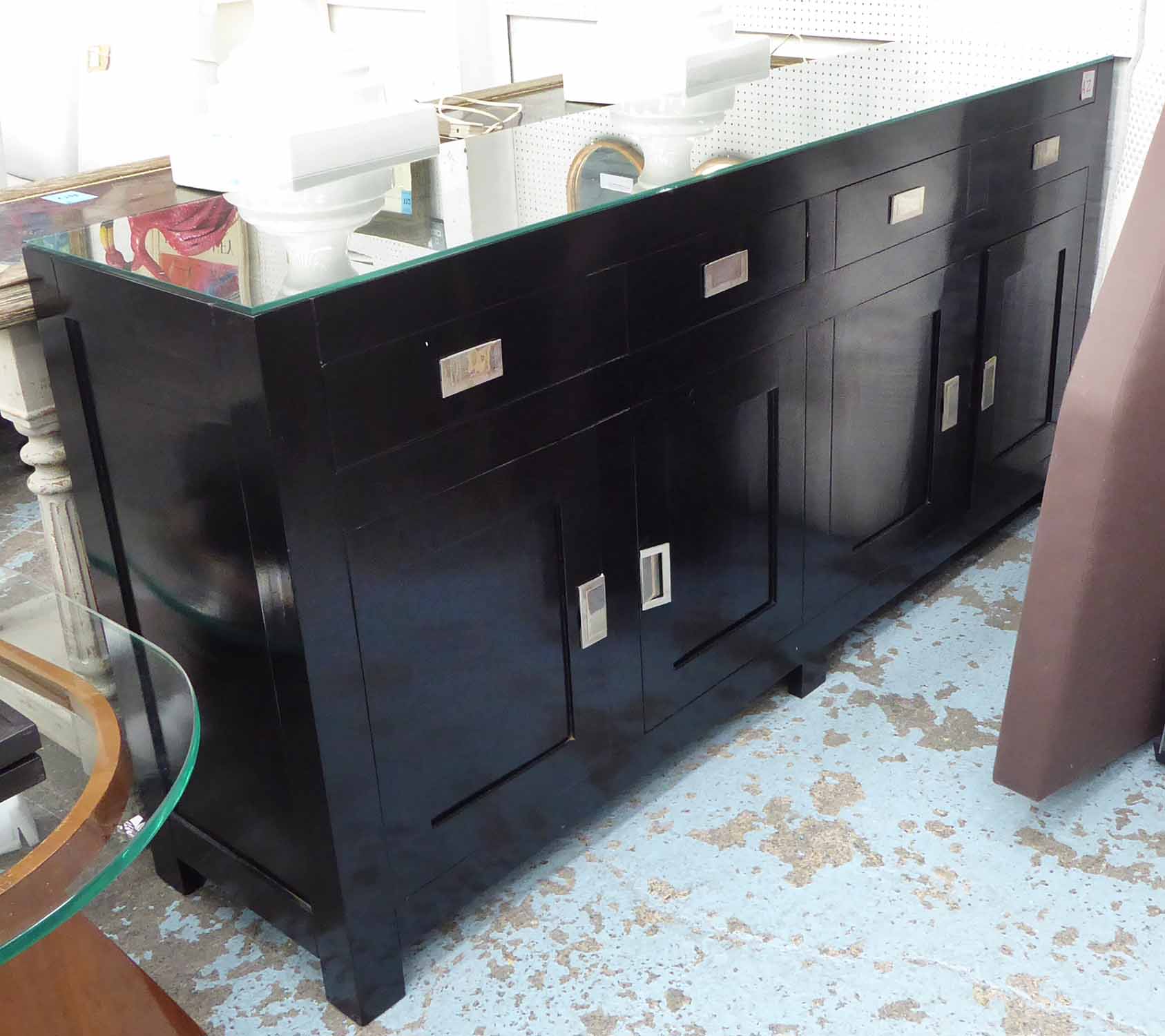 SIDEBOARD, Oriental style ebonised finish, with glass top, 191cm x 45cm x 91cm.