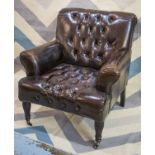 LIBRARY ARMCHAIR, 19th century style in dark brown buttoned leather, 88cm W.