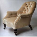 SLIPPER ARMCHAIR, Victorian button yellow velvet with turned front supports and castors, 64cm W.