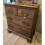 BACHELOR'S CHEST, George II mahogany, with a brushing slide and two short over two long drawers,