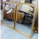 WALL MIRRORS, a pair, Continental style, gilt frames with beaded detail, 110cm x 81cm.