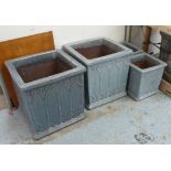 PLANTERS, a set of four, two pairs of differing sizes, dusk blue glaze,