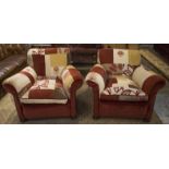 ARMCHAIRS, a pair, circa 1930, in floral patchwork and red velvet upholstery, on castors, 100cm W.