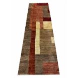 CONTEMPORARY TIBETAN ART DECO DESIGN RUNNER, 255cm x 80cm, hand knotted wool.