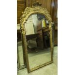 WALL MIRROR, 19th century George II style with a decorative gilt frame, 125cm H x 66cm.