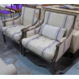 BERGERE ARMCHAIRS, a pair, French Provincial design, in a striped linen fabric, with showframes,