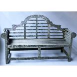 LUTYENS STYLE BENCH, silvery weathered and lichen covered teak after a design by Edwin Lutyens,