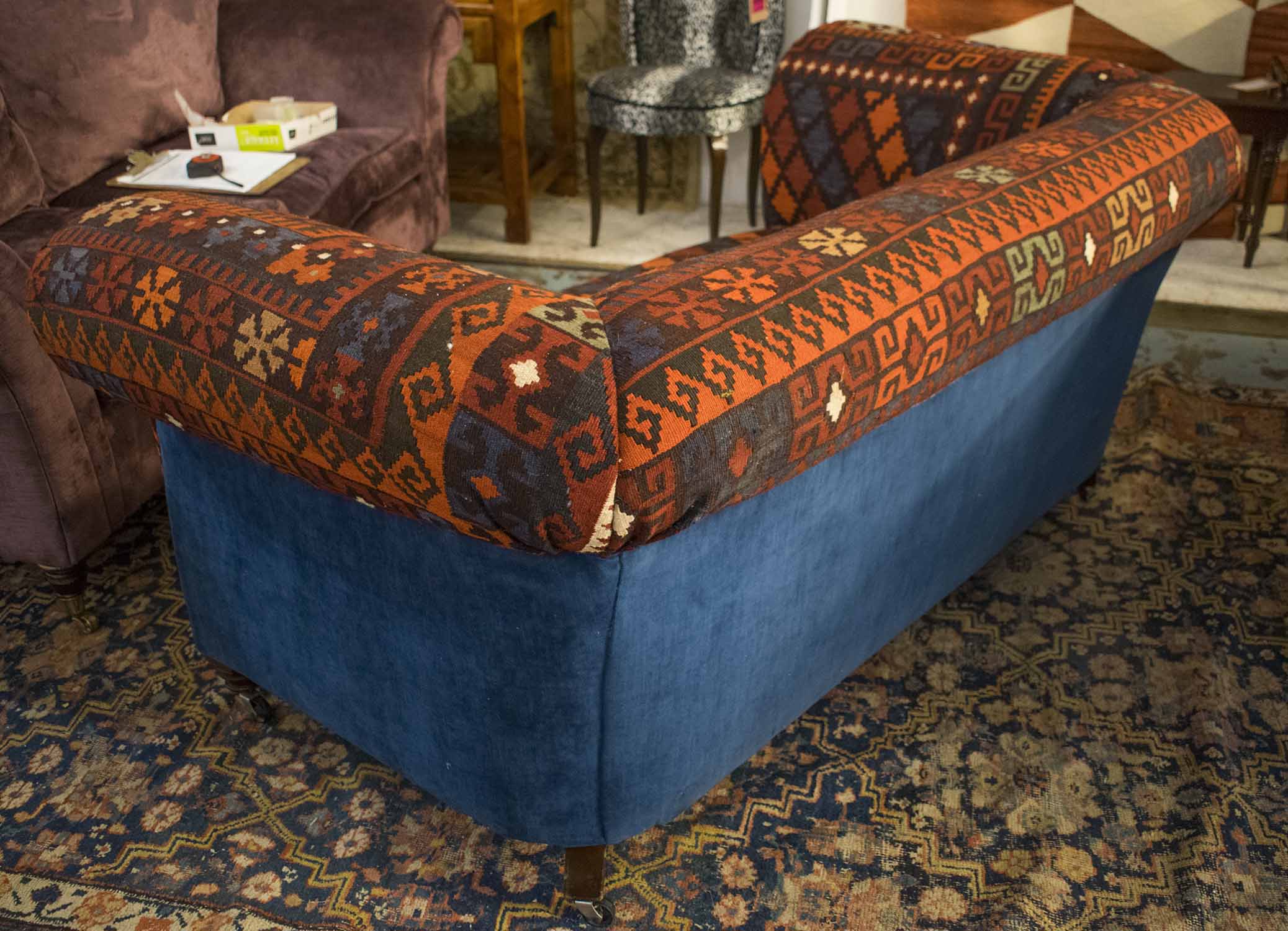 CHESTERFIELD SOFA, red kilim and blue velvet upholstered on mahogany feet and castors, 177cm x 93cm. - Image 2 of 2