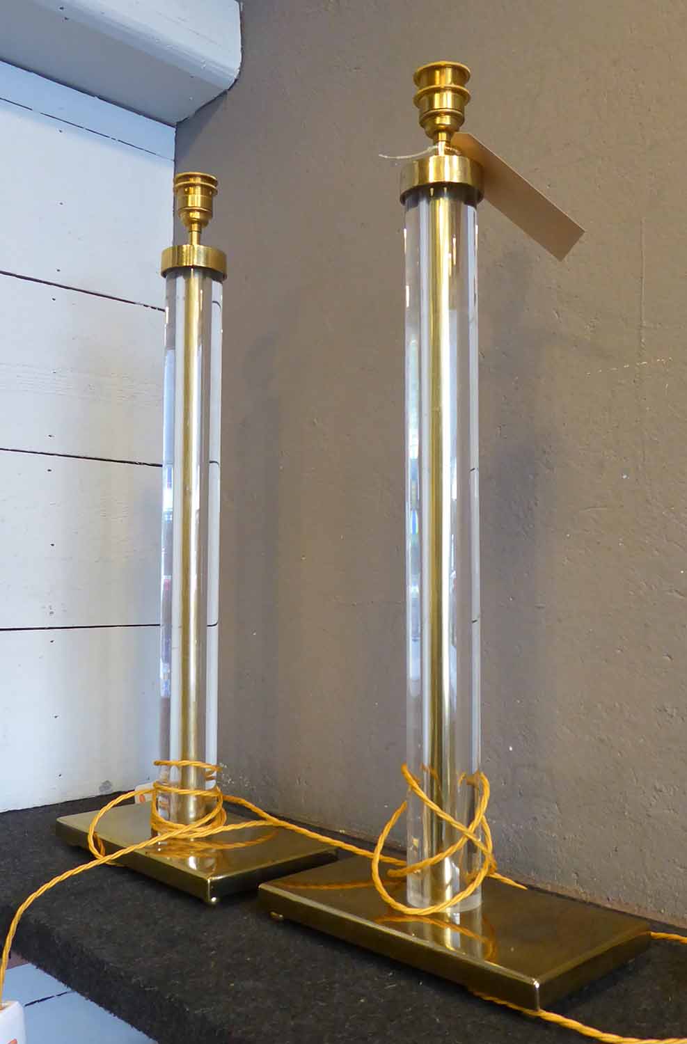 TABLE LAMPS, a pair, vintage perspex columns on brass rectangular base, each 72cm H.