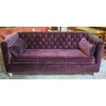 SOFA, contemporary buttoned burgundy velvet, with seat cushion and turned supports, 208cm W.