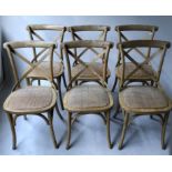 DINING CHAIRS, a set of six, Oka style limed oak bentwood with X backs and rattan cane seats,