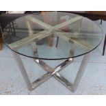 BAUHAUSE STYLE DINING TABLE, polished metal base, tempered glass top, 115cm diam x 77cm H.