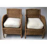 CONSERVATORY ARMCHAIRS, a pair, rattan and cane with rounded backs and seat cushion.