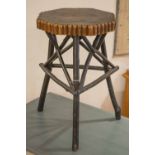 TRAMP ART OCCASIONAL TABLE, 19th century ebonised pine with octagonal top on naturalistic legs,