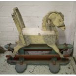 ROCKING HORSE, early 20th century, painted, 80cm H x 92cm L x 46cm W.