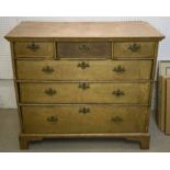 CHEST, Queen Anne faded walnut with three short above three long drawers, 93cm H x 105cm x 54cm.
